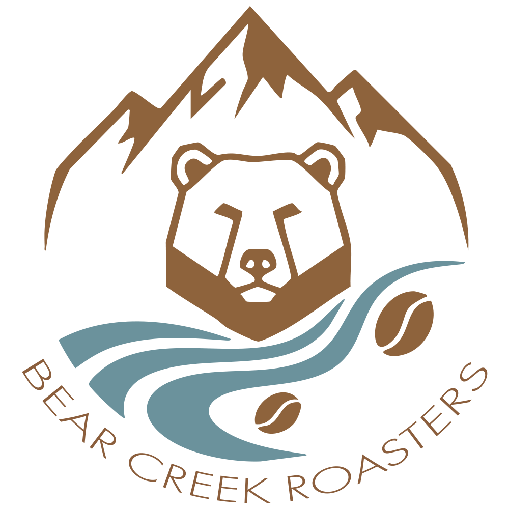 Bear Creek Roasters Logo: A bear with mountains, a creek, and coffee beans.